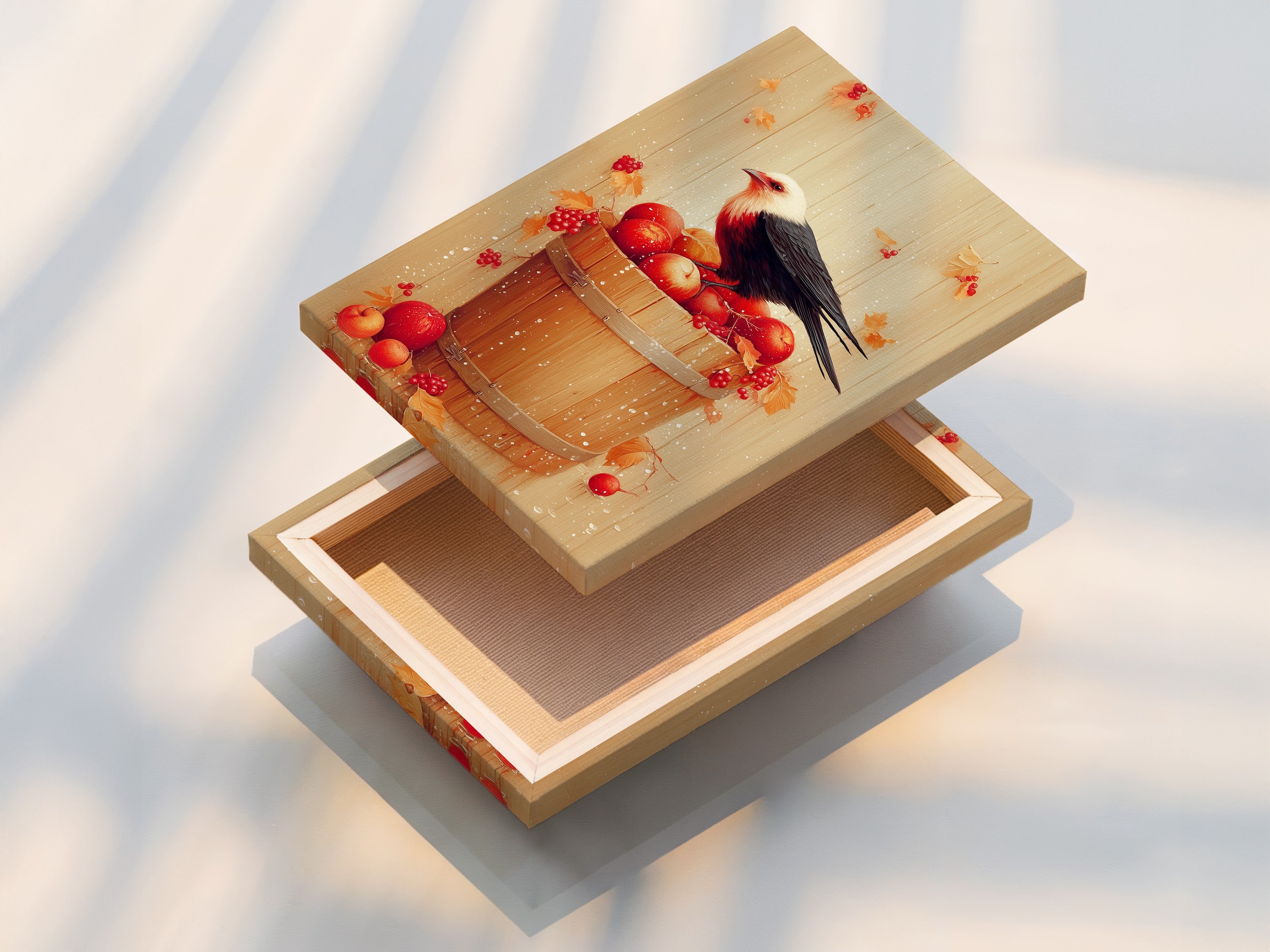 A stretched canvas print of the Bird and Apples artwork ready to hang. The rustic fall still life artwork is ideal for kitchen decor. The stretched canvas provides a gallery-wrapped look. It enhances the artwork's visual appeal. Perfect for adding a touch of farmhouse elegance to your space.