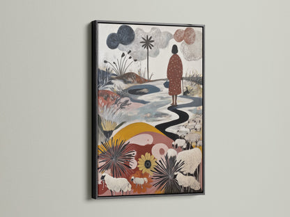 Artwork with a black frame is displayed on a white wall. The artwork features a figure walking along a winding path. Sheep graze in a field of flowers. The black frame adds a touch of sophistication. Choose a black frame today.