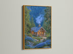 A framed forest cabin artwork with a gold frame is displayed. The artwork features a cozy mountain lodge nestled among pine trees and blue flowers. This rustic woodland cottage art brings nature indoors. The gold frame adds a touch of elegance and warmth.