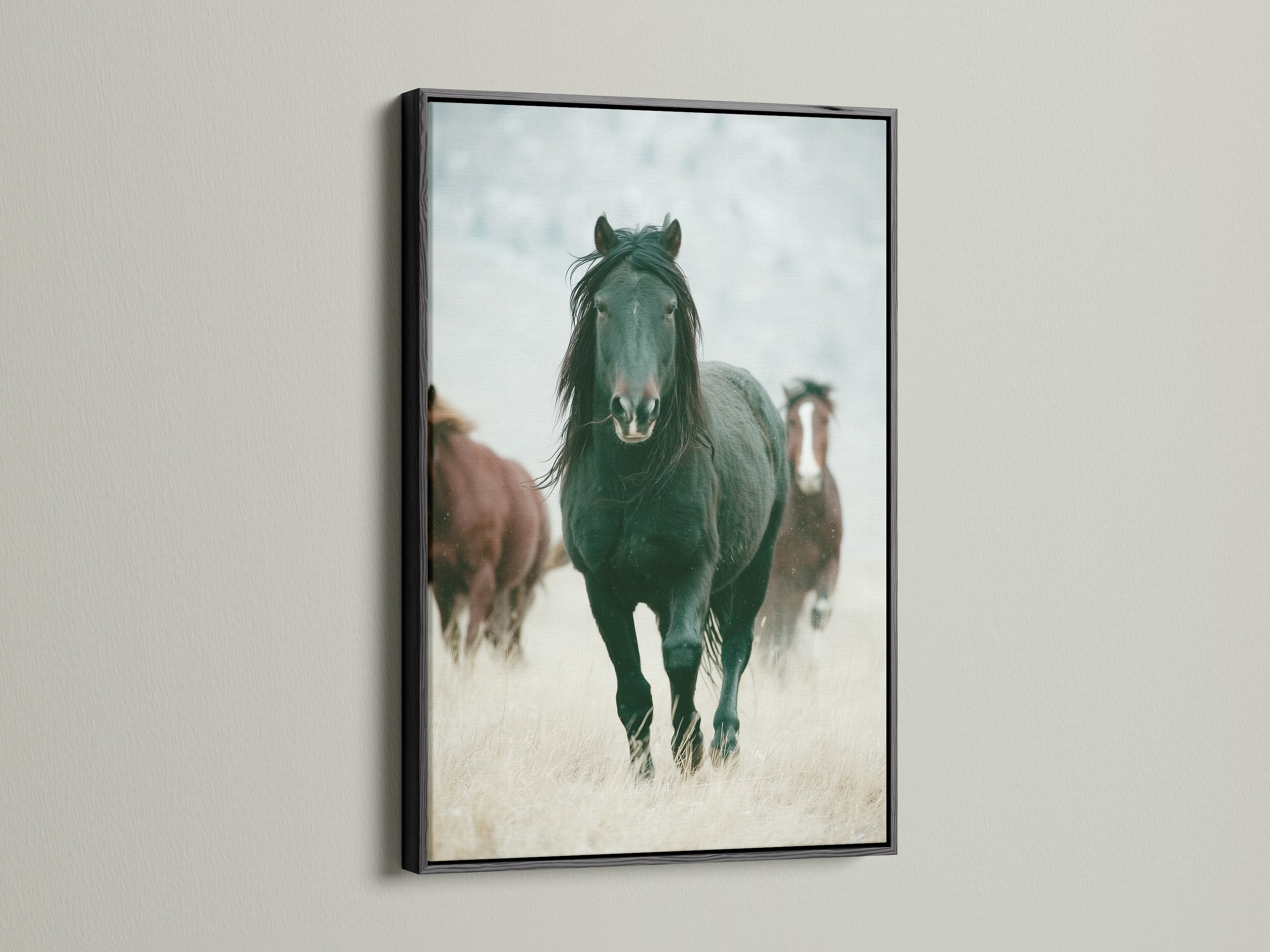 Wild horses artwork in a black frame. This rustic artwork adds a touch of the Wild West to any room. Perfect for living rooms bedrooms or offices seeking a country or farmhouse style. This artwork is great for ranchers or anyone that appreciates wildlife art. A black frame offers a modern touch.