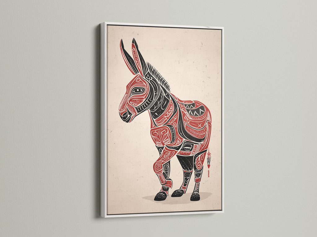 The Tribal Donkey artwork is framed in white. This image highlights the contrast of the red and black art against the white frame. The geometric animal print is perfect for tribal decor. This southwestern art piece is a stylish addition to any space. It enhances office spaces and rustic homes.