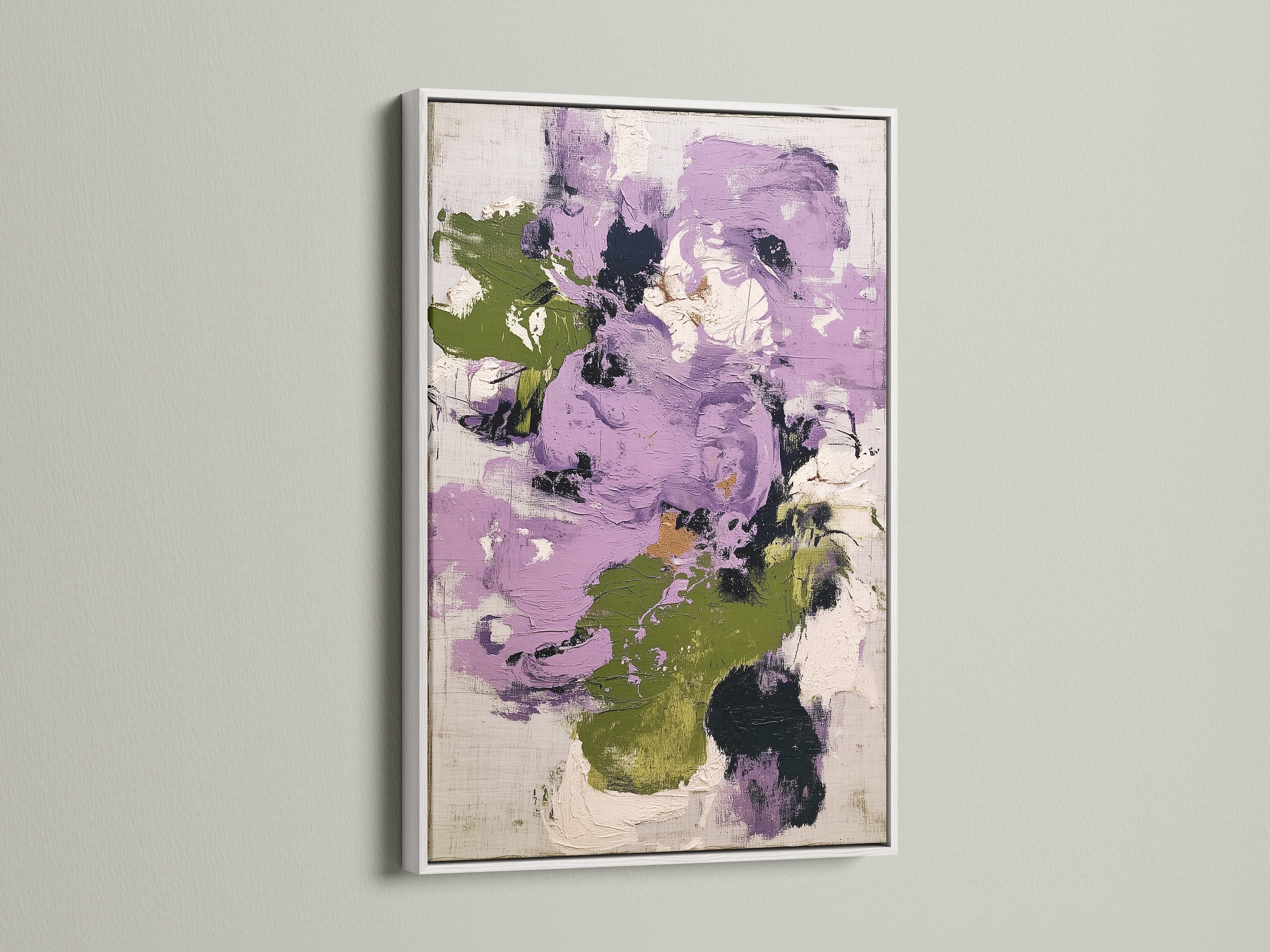 Abstract floral artwork in purple and green tones set in a white frame. This contemporary print offers a clean and modern aesthetic. Ideal for enhancing bedroom wall decor. The artwork's vibrant colors and abstract style create a focal point in any space.