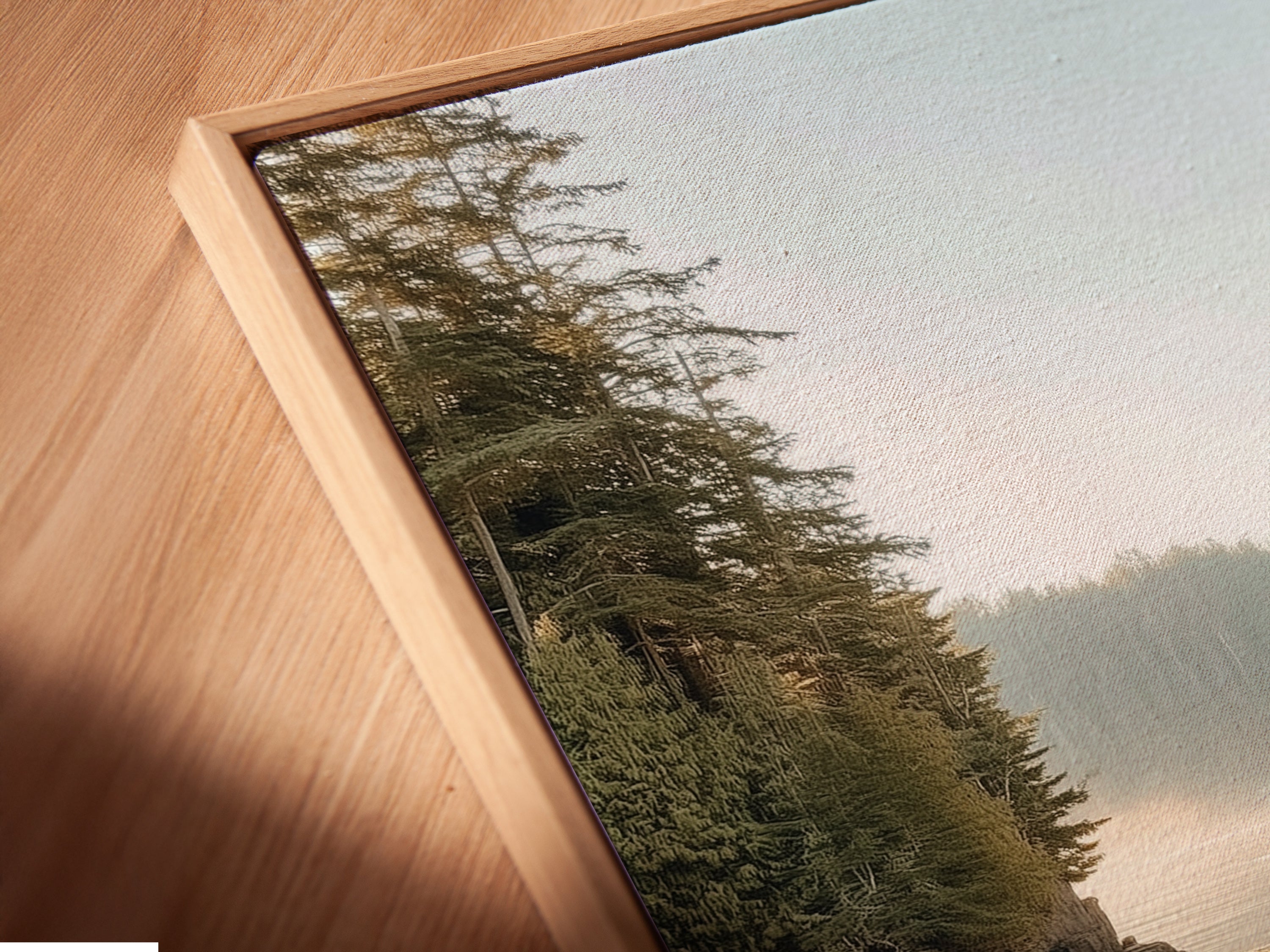 Angled close-up reveals a canvas print in a floating frame. This framing style enhances the artwork depth and dimension. A stylish way to display serene landscape in your lake house. Explore available floating frame options today.