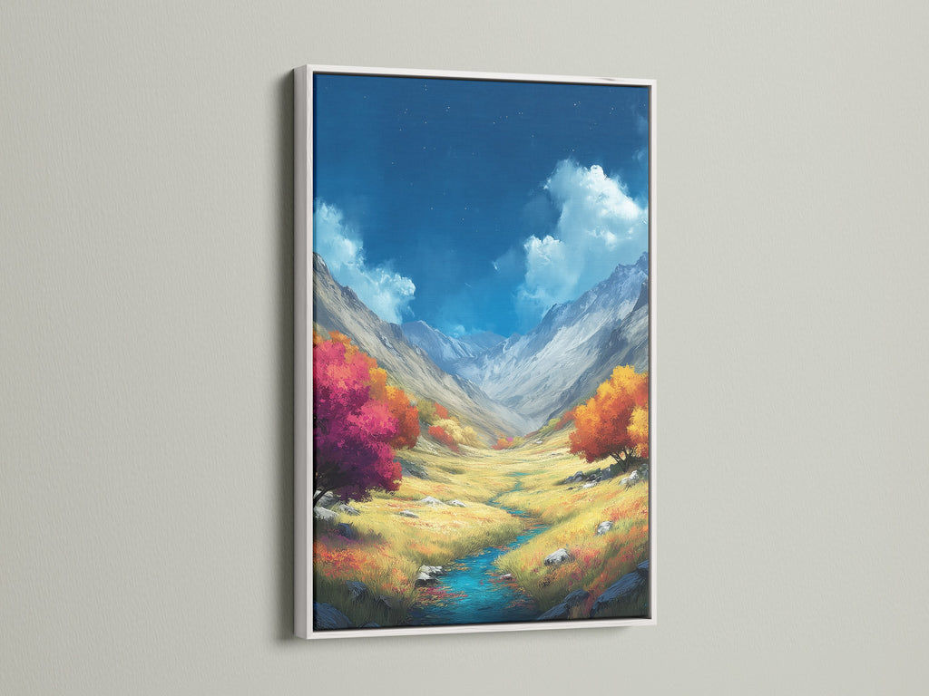 Mountain Valley Canvas Print in a White Frame. The nature artwork showcases autumn scenery. It's perfect for adding colorful nature to your home. A white frame enhances any space. This landscape print brings a serene mountain vista indoors. A great piece for home wall art.