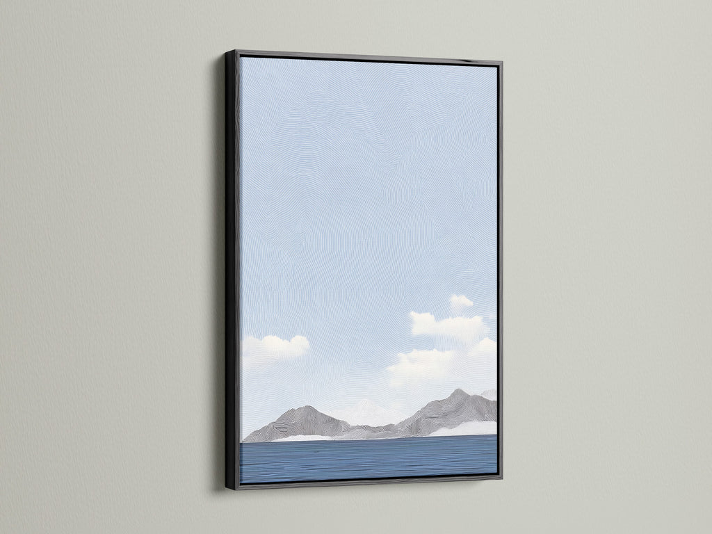 A black frame presents a striking piece of art. The artwork shows mountains by the sea. The black frame creates a bold modern statement. Add contrast and elegance to your space. This frame focuses on the art.