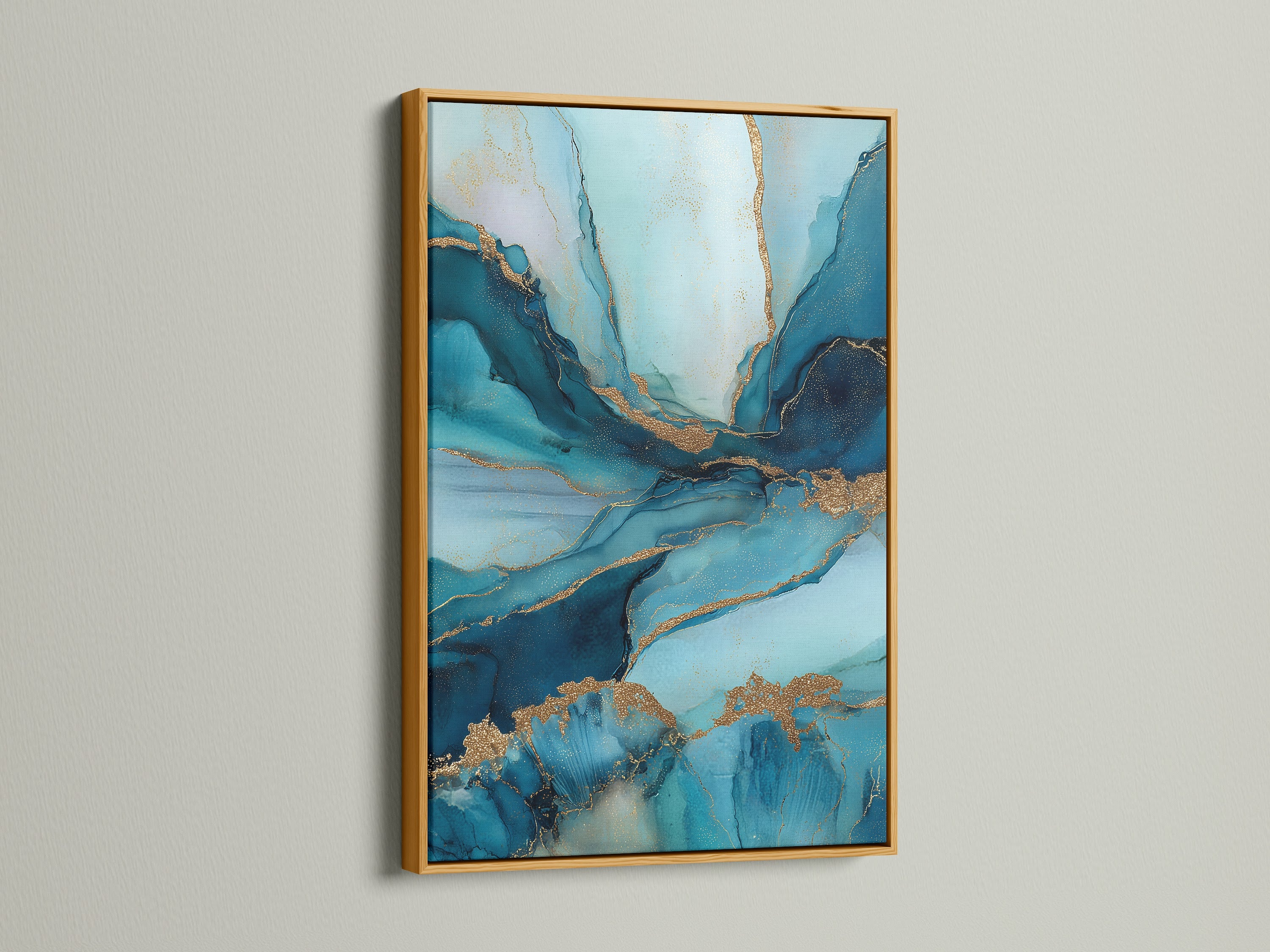 The abstract blue and gold artwork is showcased in a luxurious gold frame. The shimmering frame enhances the fluid teal marble art. This elegant piece adds a touch of glamour to any room. Perfect for creating a focal point in your living space. The gold accents complement the artwork's modern style.