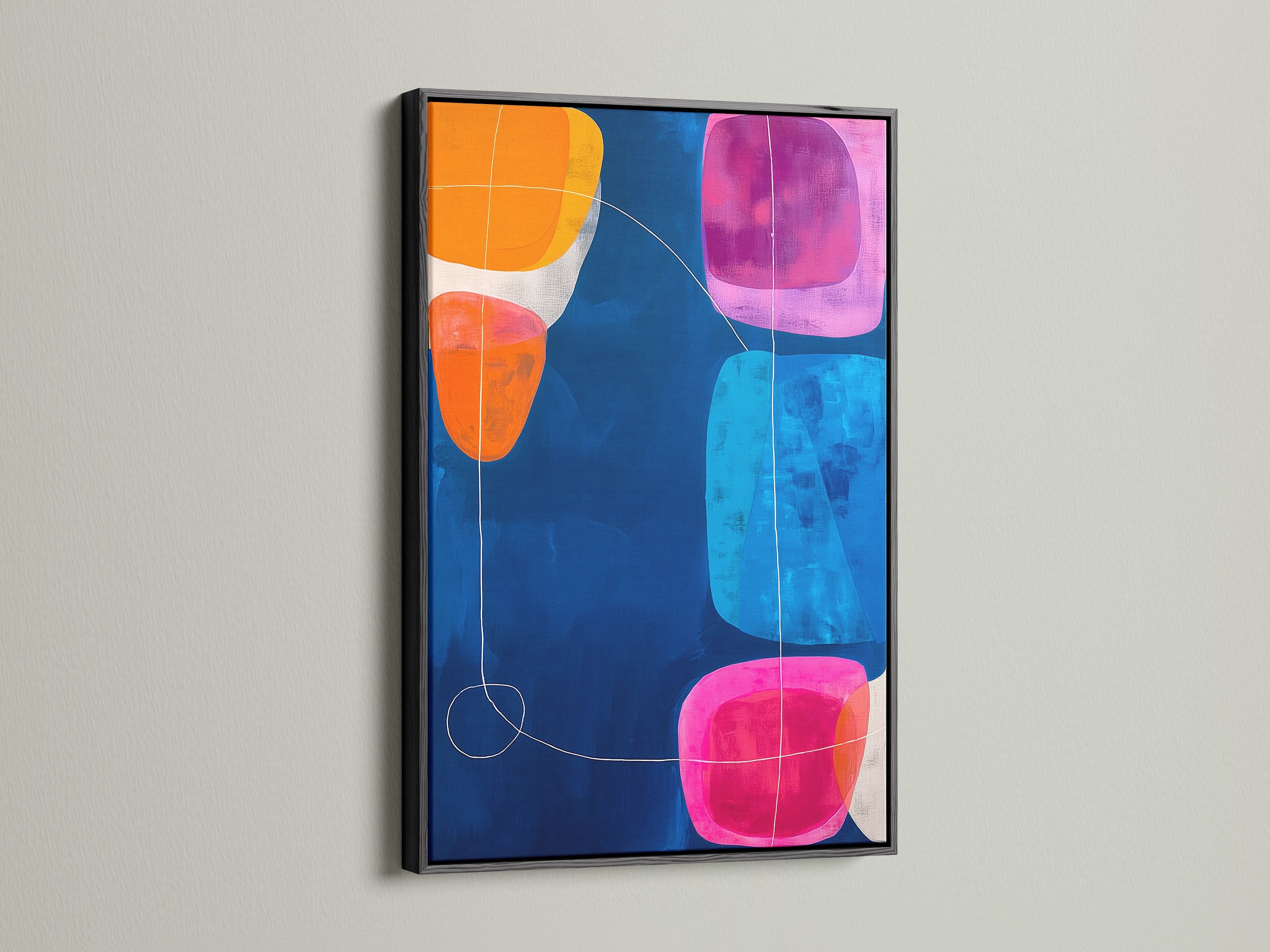 Colorful Abstract Artwork in a Black Frame. This striking geometric canvas art features a navy blue backdrop with vibrant pink orange and blue elements. Ideal for adding a touch of modern style to your living room or office. A perfect choice for contemporary art lovers
