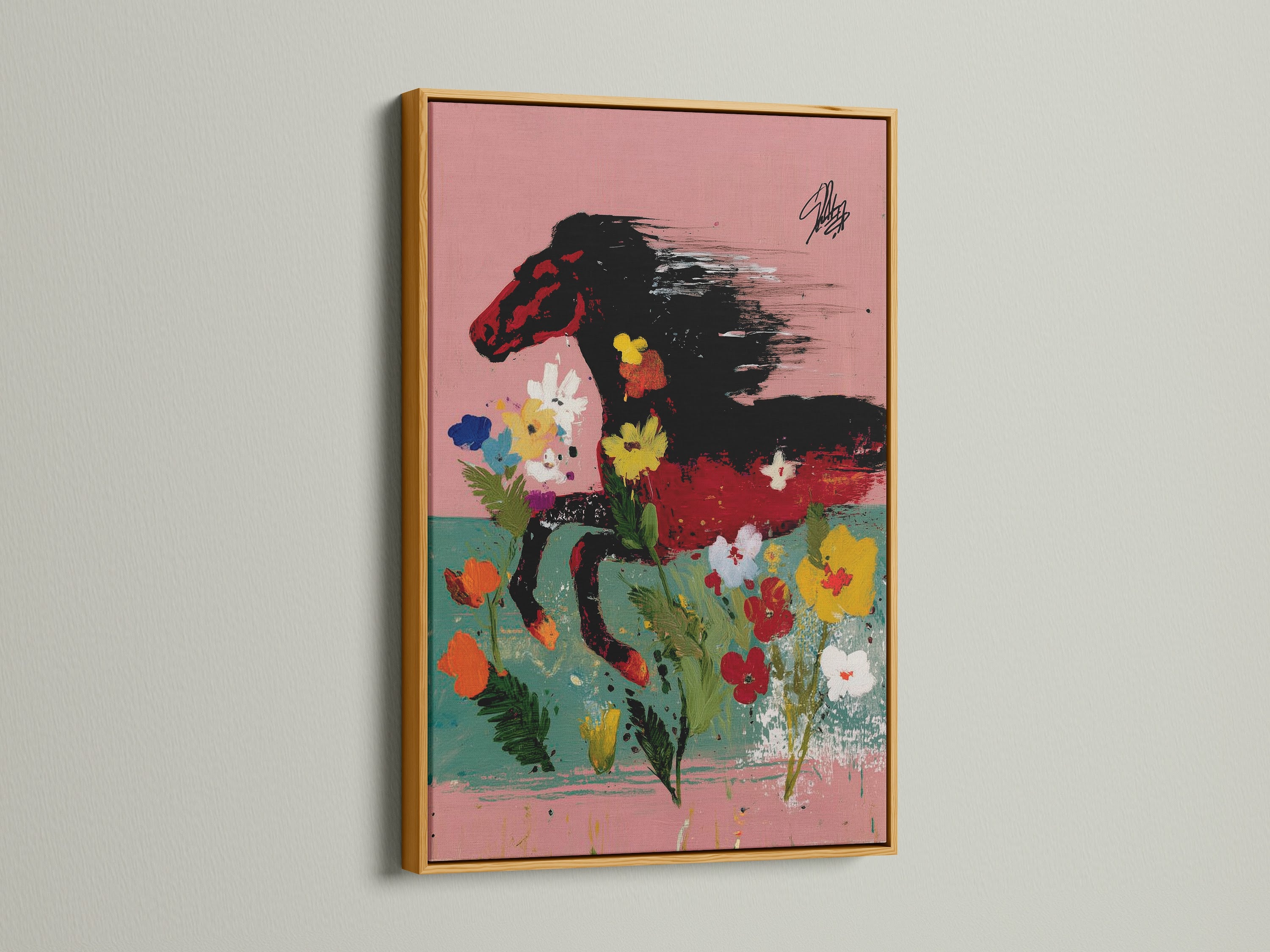 Wild Horse Canvas Art highlighted by a gold frame. This colorful horse art is a stunning addition to any space. The floral abstract animal print offers a touch of bohemian charm. Perfect for adding a pop of color and style to your home.