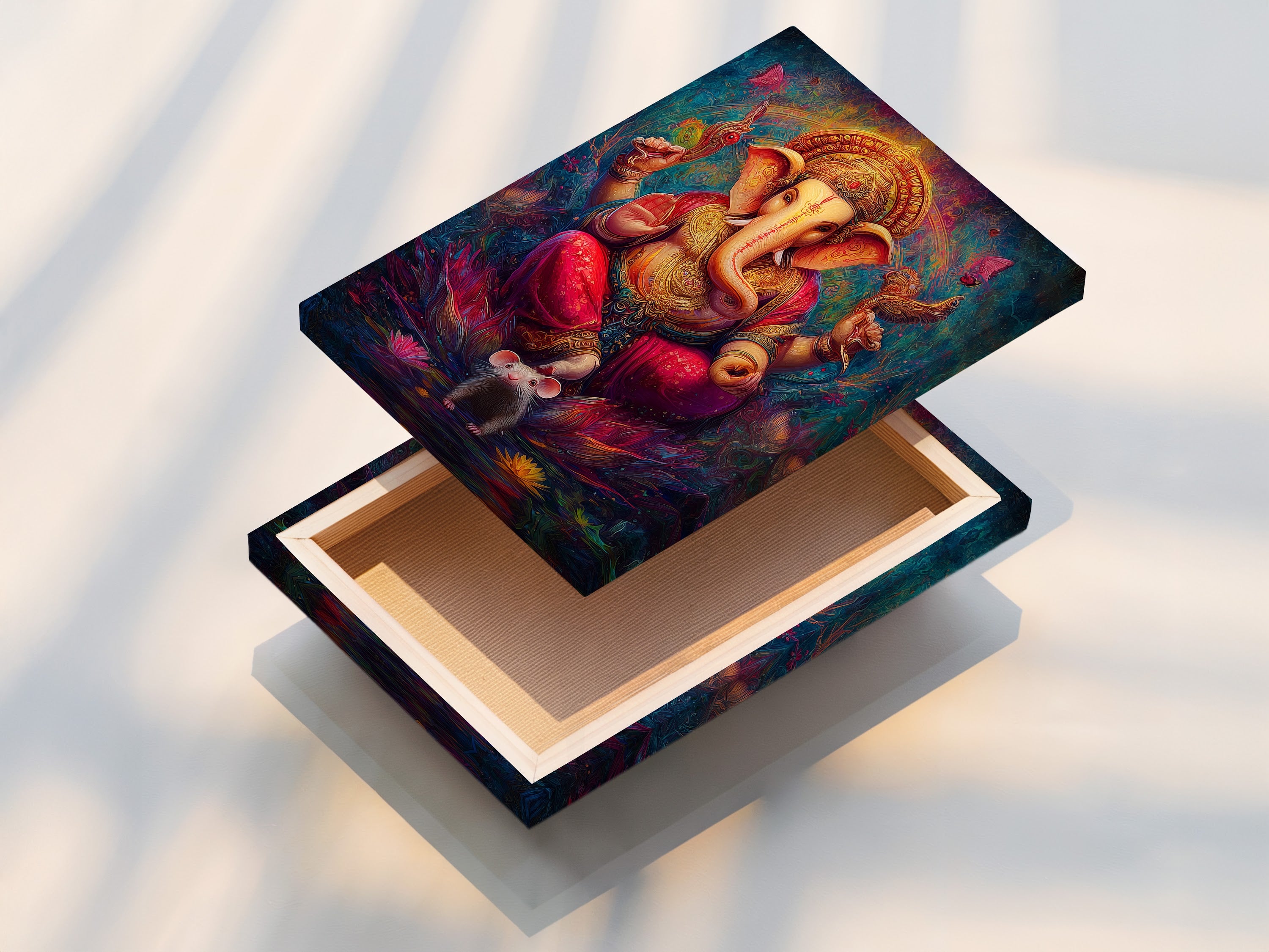 Close up of a stretched Ganesha canvas print. This Hindu God wall art provides spiritual decor. It is bohemian art perfect for a meditation room. The colorful sacred artwork features an elephant god print. It adds cultural richness to your space.