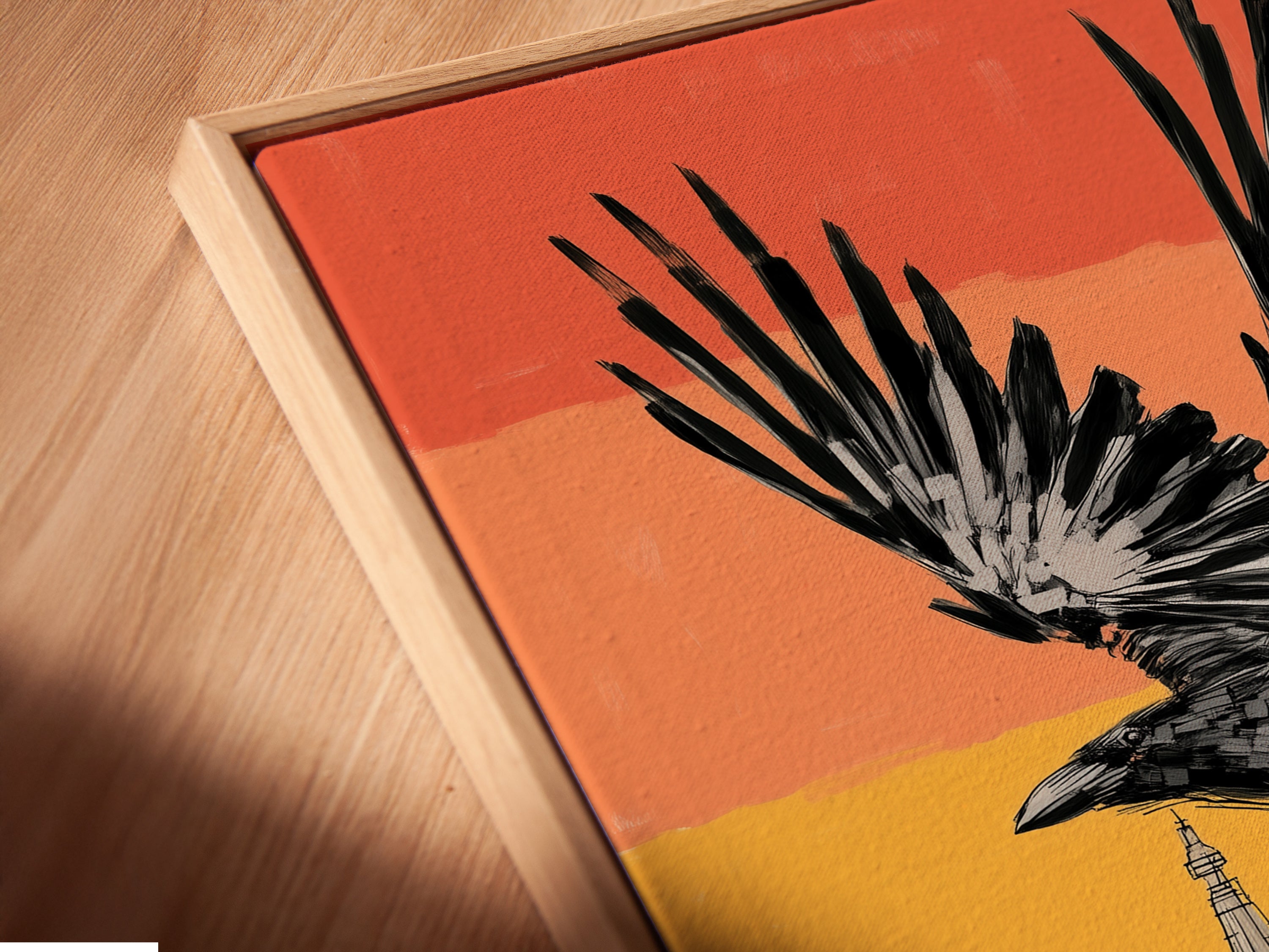 A close-up angled view of a canvas print in a floating frame. The Gothic Raven Wall Artwork adds depth and sophistication to any space. Perfect for showcasing fine art prints and gothic home decor. It enhances living rooms and offices with unique style.