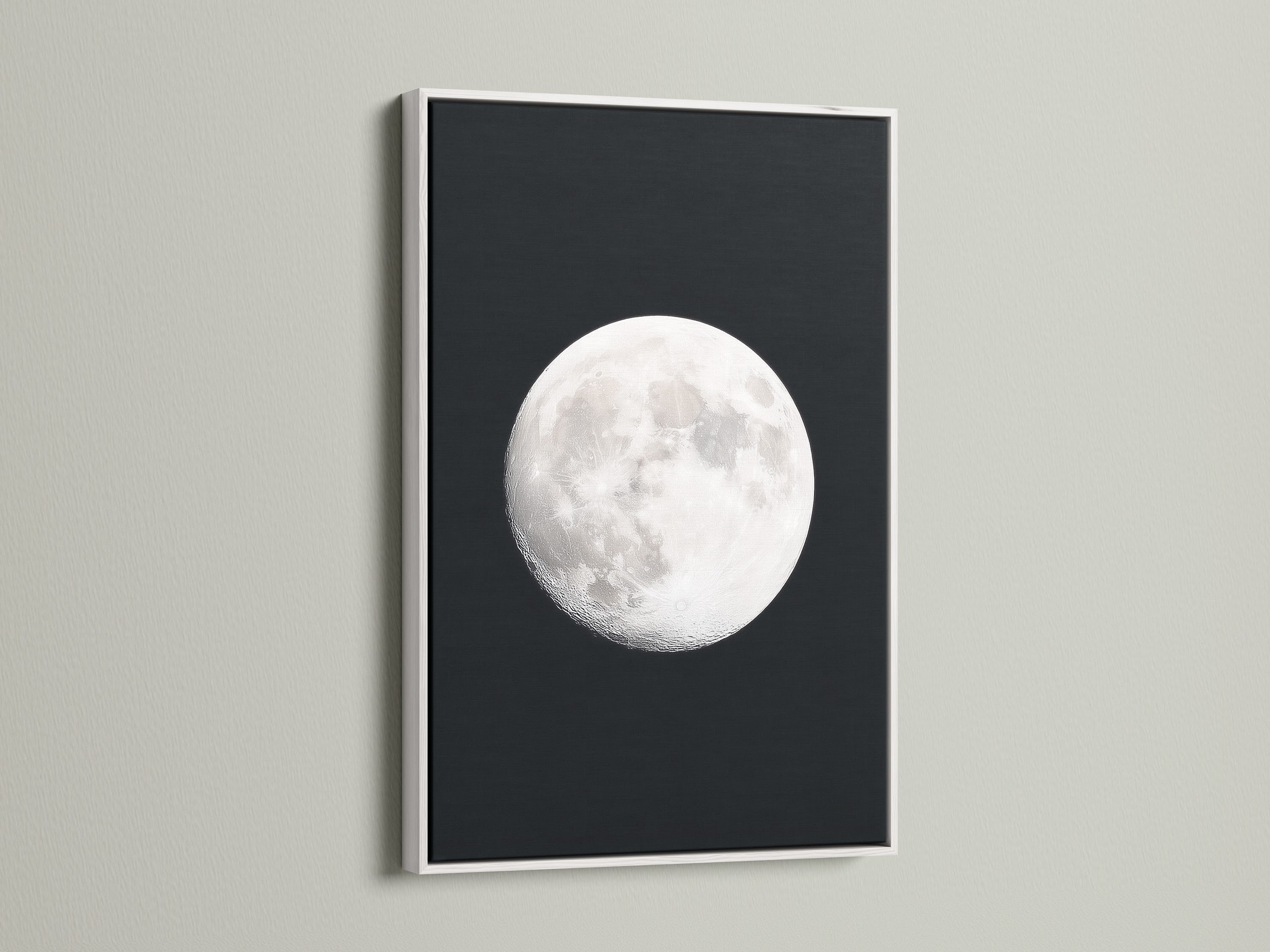 Full Moon lunar phase artwork with a white frame. This celestial art brings astronomy decor to any bedroom. It is a moon phase art showcase. It enhances space themed art in modern settings. It is a great astrology gift. This is a beautiful night sky print. Ideal as full moon artwork and a celestial print.