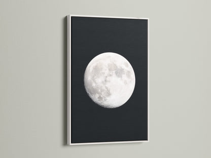 Full Moon lunar phase artwork with a white frame. This celestial art brings astronomy decor to any bedroom. It is a moon phase art showcase. It enhances space themed art in modern settings. It is a great astrology gift. This is a beautiful night sky print. Ideal as full moon artwork and a celestial print.
