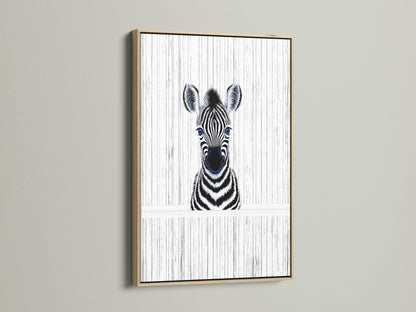 A charming Baby Zebra artwork framed in oak. This minimalist zebra wall art adds a touch of safari to any nursery or kids room. The oak frame enhances the black and white animal poster. A perfect piece of monochrome art.