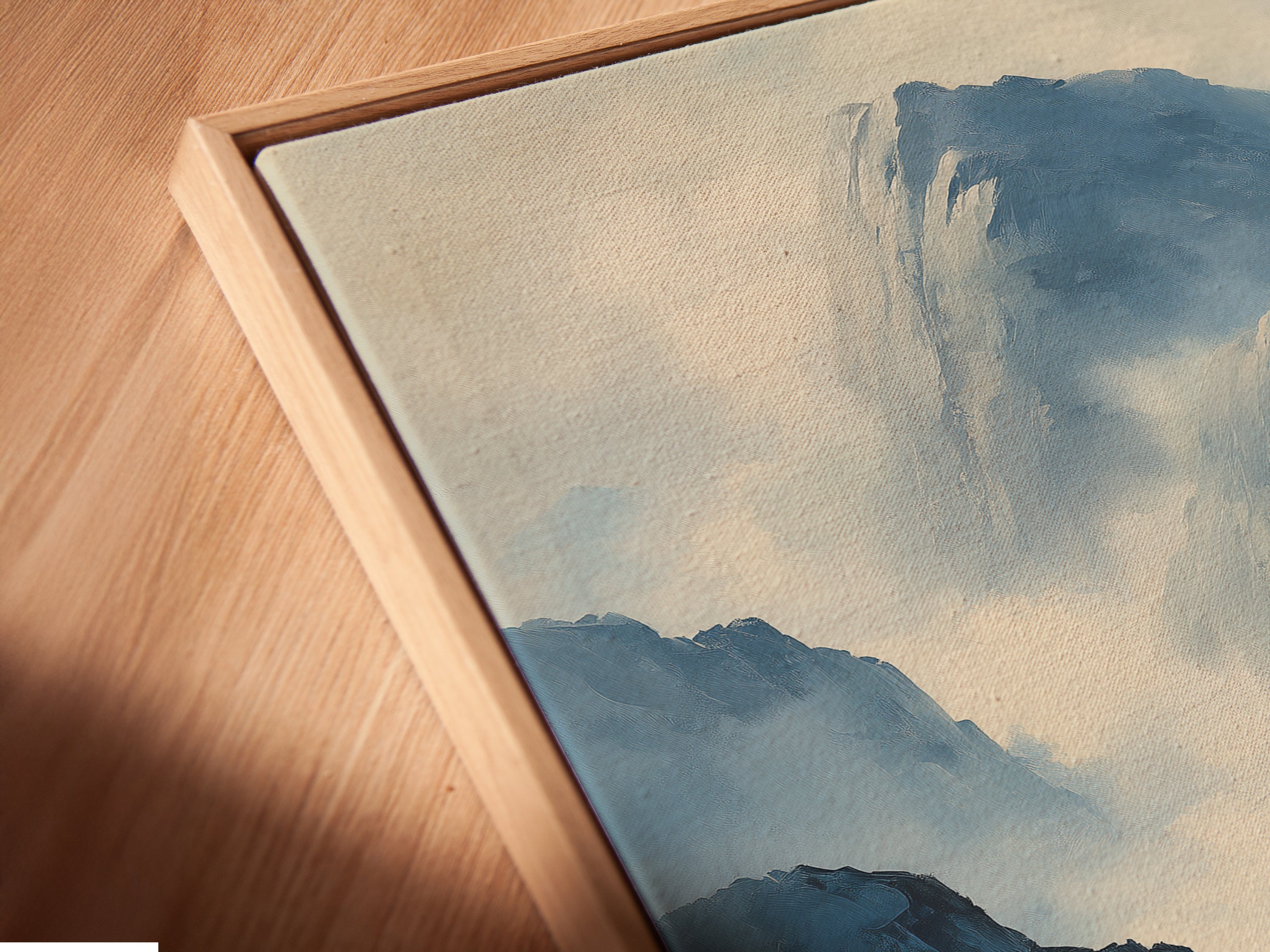 A close up of a canvas print in a floating frame. The artwork appears to float. This adds a modern touch to any space. The floating frame enhances the artwork's beauty. It creates a gallery like feel in your home. This style is perfect for showcasing fine art. It is ideal for contemporary decor. This unique framing option elevates your artwork.