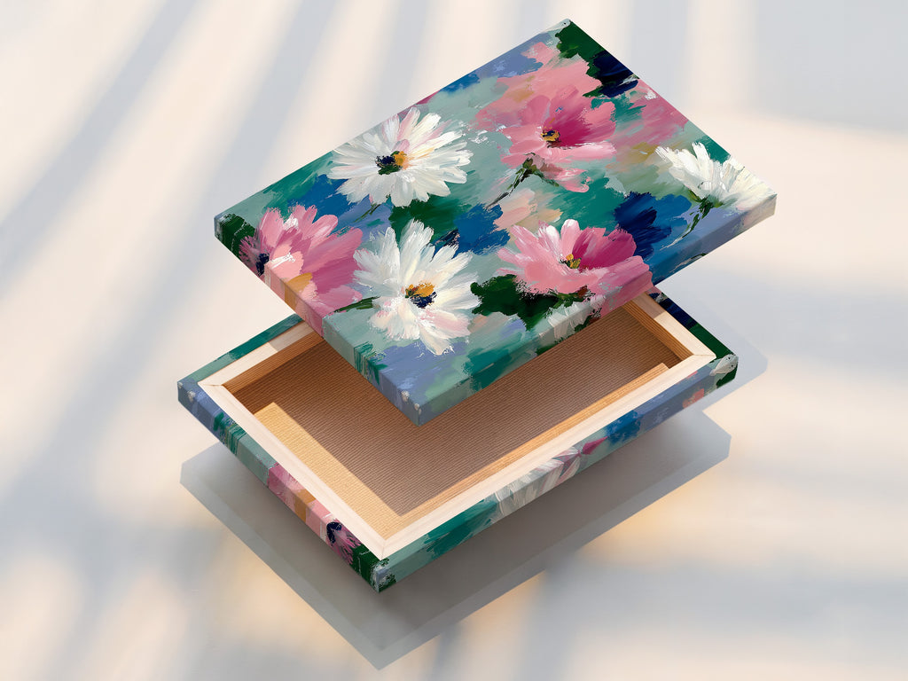 A stretched canvas print of abstract floral art. The artwork features pink and white daisies. Stretched canvas prints provide a gallery-ready look. This botanical canvas will add a touch of elegance to your living room wall art or bedroom decor.