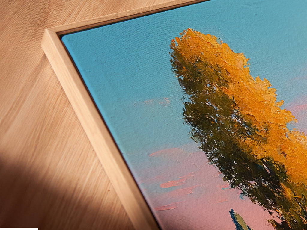 Close-up of a canvas print in a floating frame. The Tuscany Landscape artwork features golden poplar trees. This country path print adds a touch of elegance. Ideal for living room wall art and office wall art.