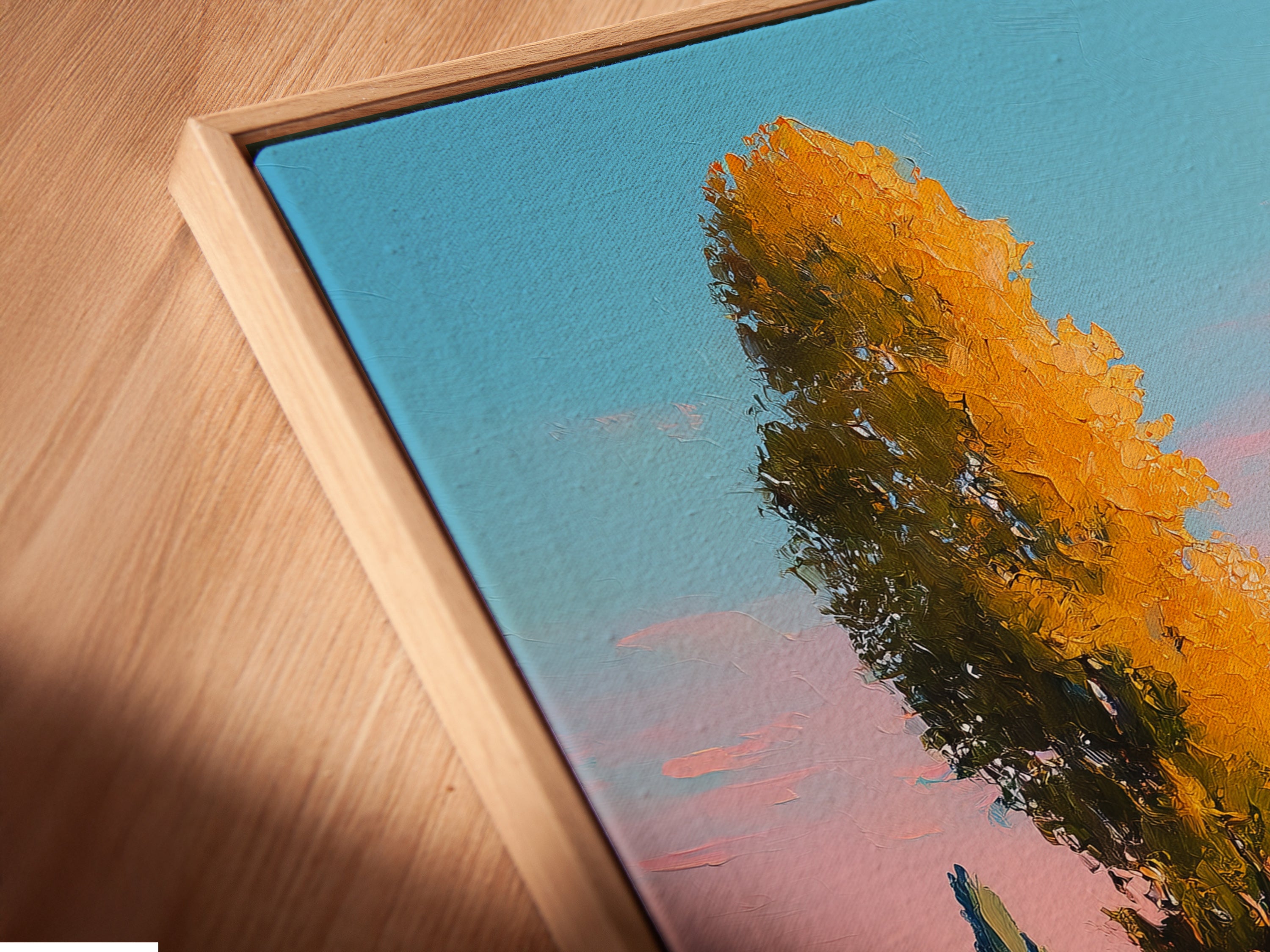Close-up of a canvas print in a floating frame. The Tuscany Landscape artwork features golden poplar trees. This country path print adds a touch of elegance. Ideal for living room wall art and office wall art.