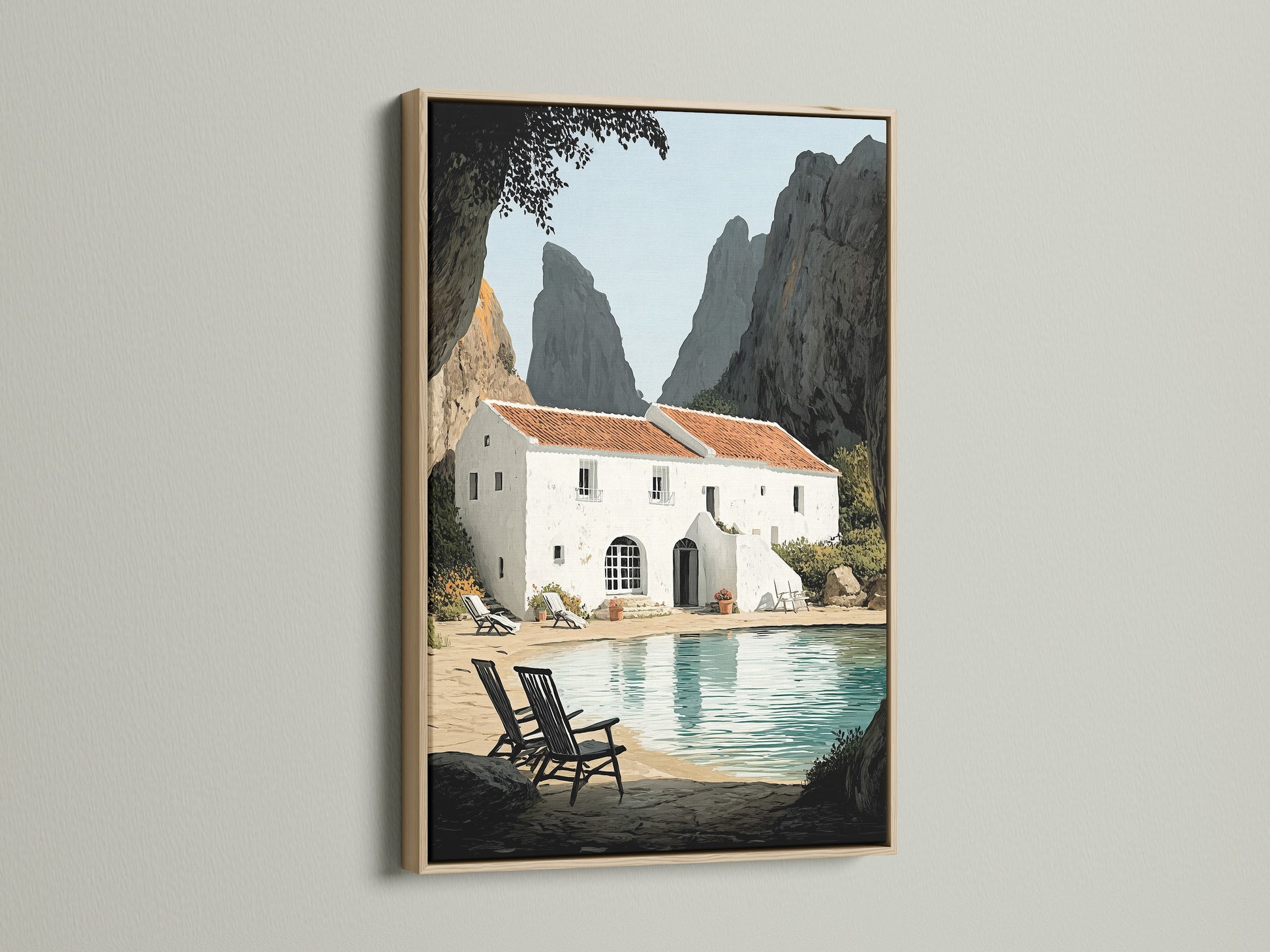 Framed coastal villa artwork with an oak frame on a white wall. The warm tones of the oak enhance the Mediterranean sea wall art. Perfect for living rooms bedrooms and beach houses. Bring a touch of the Italian Riviera to your home.
