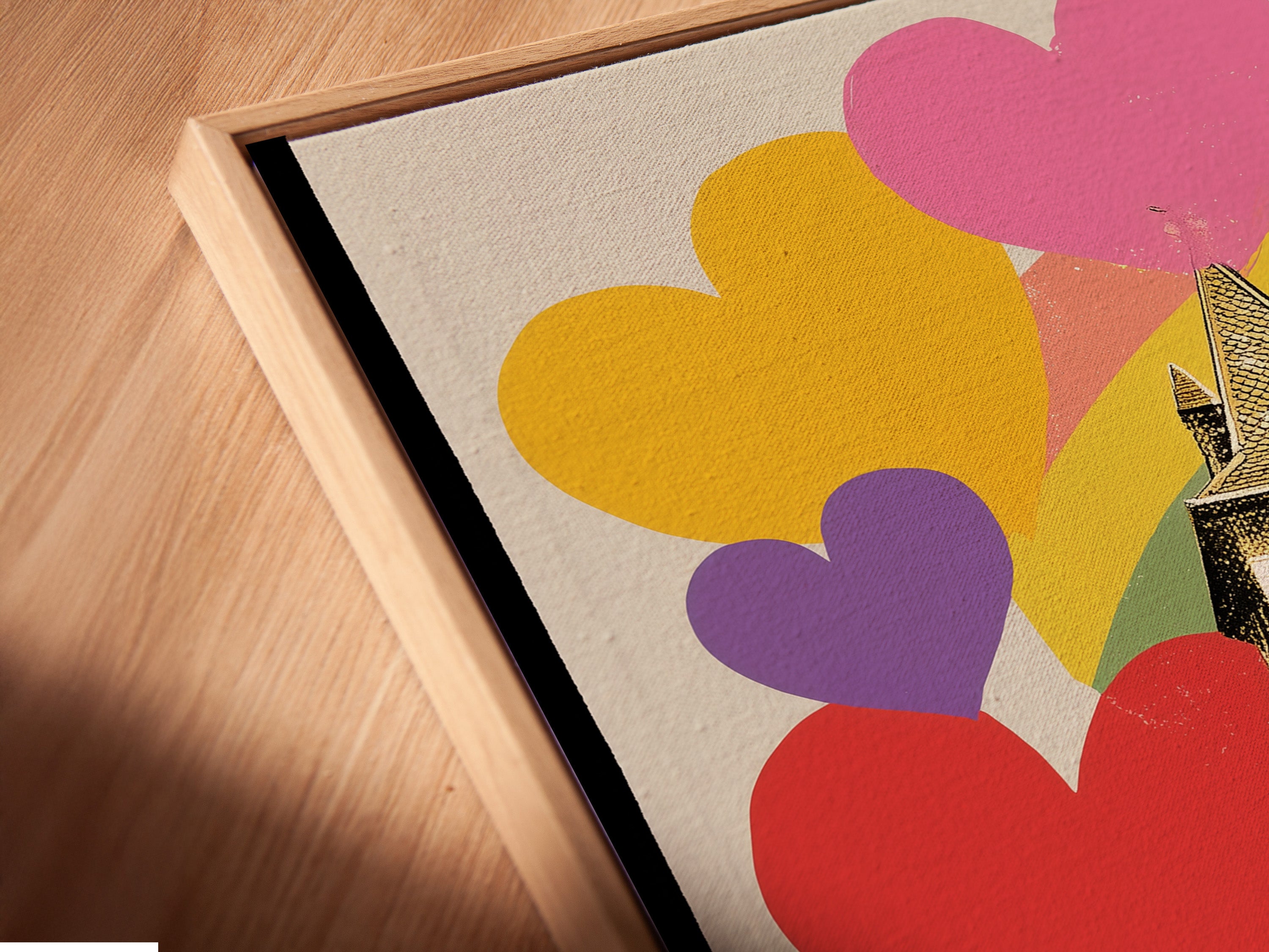 Angled close-up of a canvas print in a floating frame. The artwork features a church rainbows and hearts. The floating frame gives a modern gallery look. It makes the canvas print stand out. Perfect for contemporary spaces. Buy this piece today