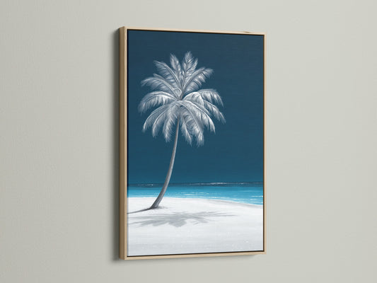 Coastal wall decor featuring a palm tree art print in an oak frame. Navy blue beach canvas print evokes a seaside feel. Ideal beach house decor for a tropical aesthetic.