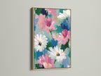 Enhance your home with this abstract floral art. The pink and white daisy artwork is showcased in a natural oak frame. This botanical canvas print adds a touch of contemporary style to any room. Perfect as living room or bedroom wall decor.