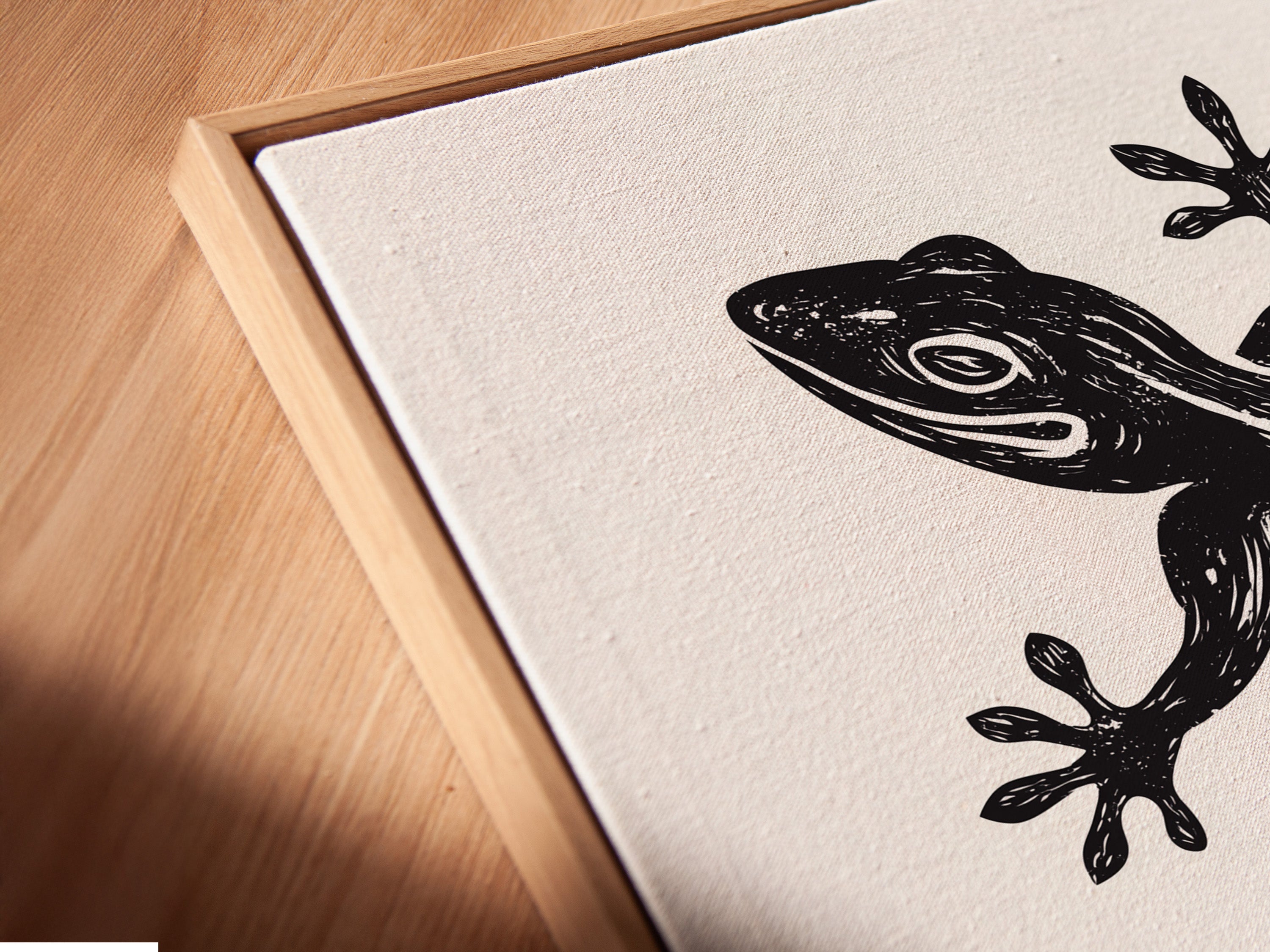 Close-up shows a canvas print in a floating frame. The canvas texture is visible. The floating frame adds depth and dimension. The artwork appears to float within the frame. This framed canvas is modern and eye-catching.