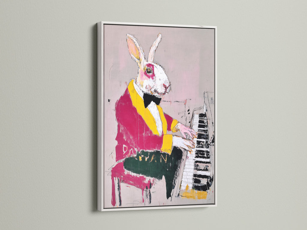 Rabbit Pianist Art Print in a white frame. This artwork adds a touch of whimsy to your walls. Perfect for music lovers. The animal portrait art is a great fit for living rooms and offices. Get your quirky wall decor now.
