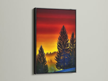 A striking forest sunset artwork in a black frame. This nature wall art features warm tones and a captivating landscape. The pine tree artwork adds a rustic touch to any room. Perfect for creating a cozy atmosphere in bedrooms living rooms or cabins. Enhance your decor with this stunning print.