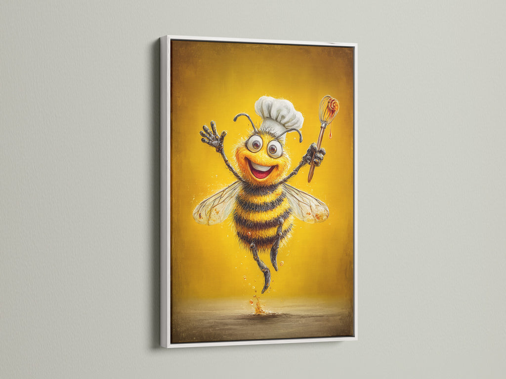 Chef Bee artwork in a white floating frame. This cooking art print enhances any kitchen. The whimsical bee print is perfect for cafe decor. Elevate your dining room wall decor with funny kitchen art.