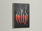 A close-up showcases red hot chili pepper artwork. It is framed in oak. The art is displayed on a clean white wall. This spicy food print adds a culinary touch to kitchens and bistros. Ideal for food lovers seeking modern kitchen wall decor.