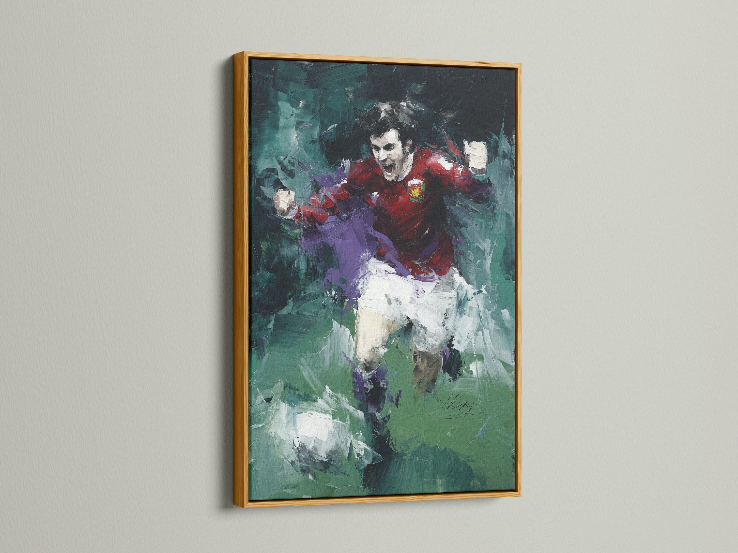 A soccer player canvas art piece with an abstract sports theme is displayed in a gold frame. The artwork is a dynamic action painting. This sports wall art is perfect for minimalist Scandinavian or eclectic styles. It will enhance any room.