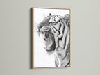 An oak frame showcases a striking tiger artwork. The natural wood grain of the oak complements the art. Its neutral tone ensures it will suit many interior styles. Perfect for adding a touch of nature-inspired elegance to your walls.