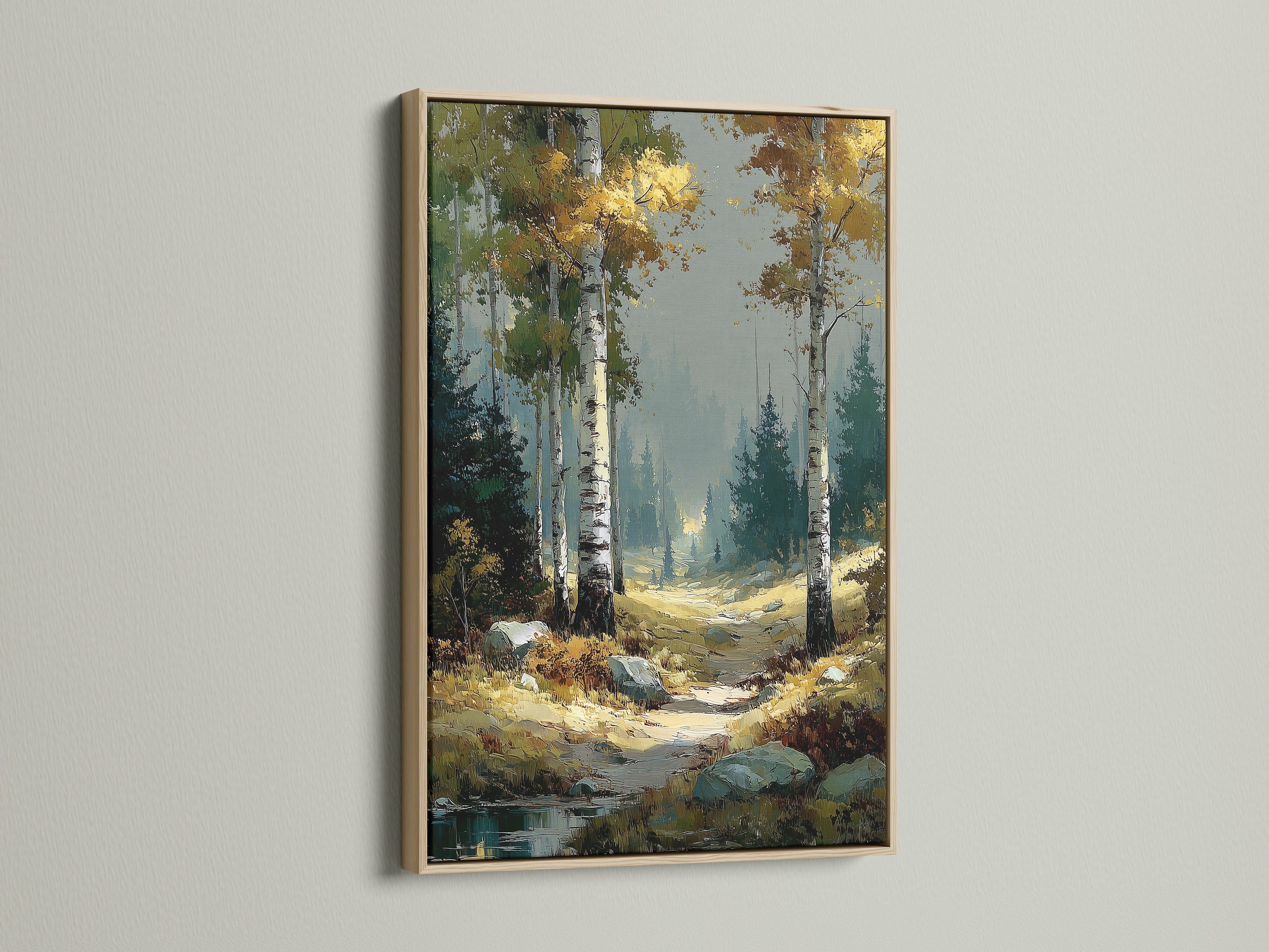 Birch Forest autumn landscape artwork with an oak frame. The nature canvas print highlights the beauty of birch trees. It is perfect for rustic wall decor. This woodland decor brings a touch of fall colors indoors. Elevate your space with this stunning forest wall art.