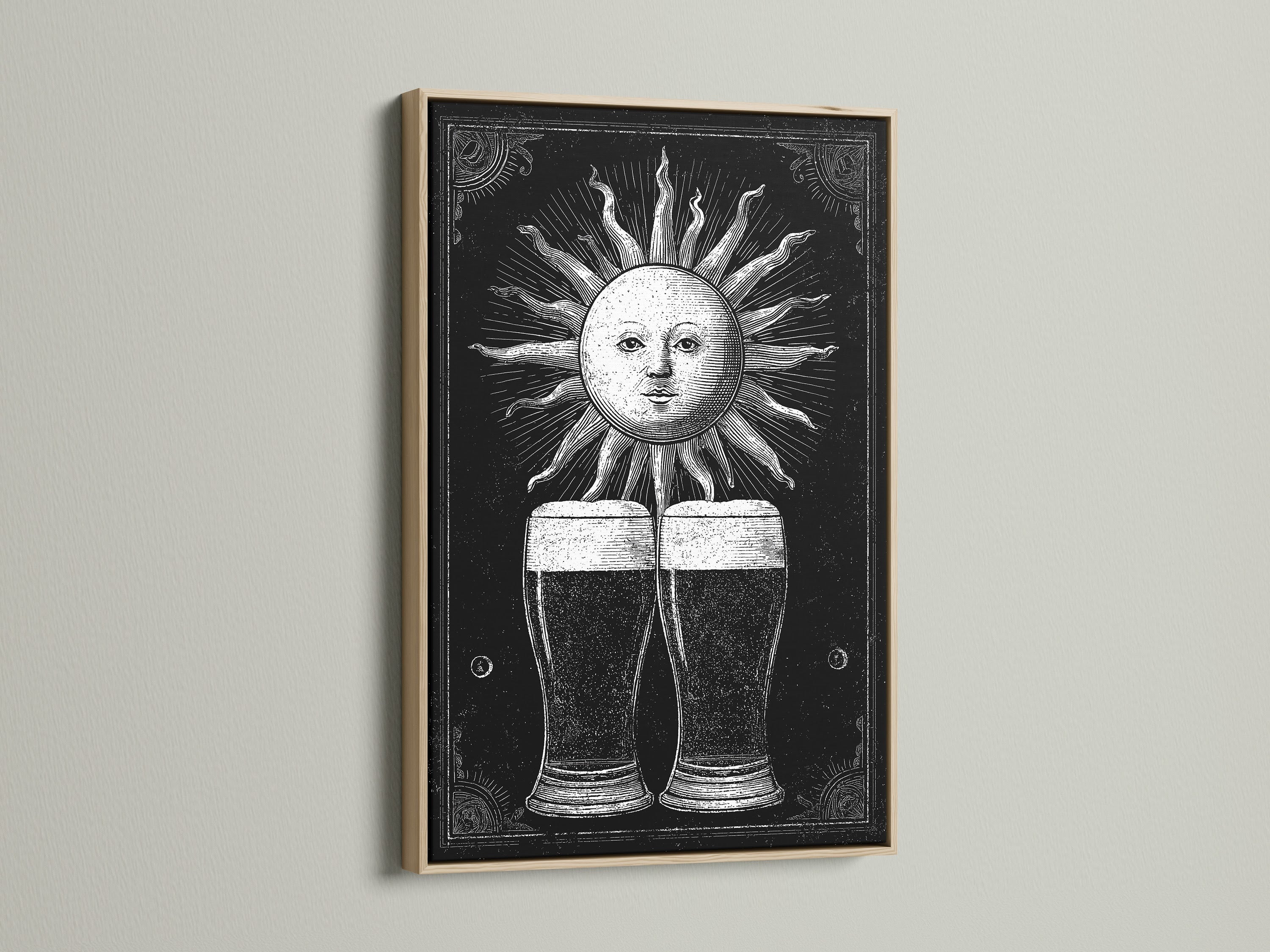 A framed print is showcased with an oak frame. The artwork features a vintage sun illustration. The art print shows two glasses of beer beneath the sun. Oak frames offer a natural touch to your artwork.