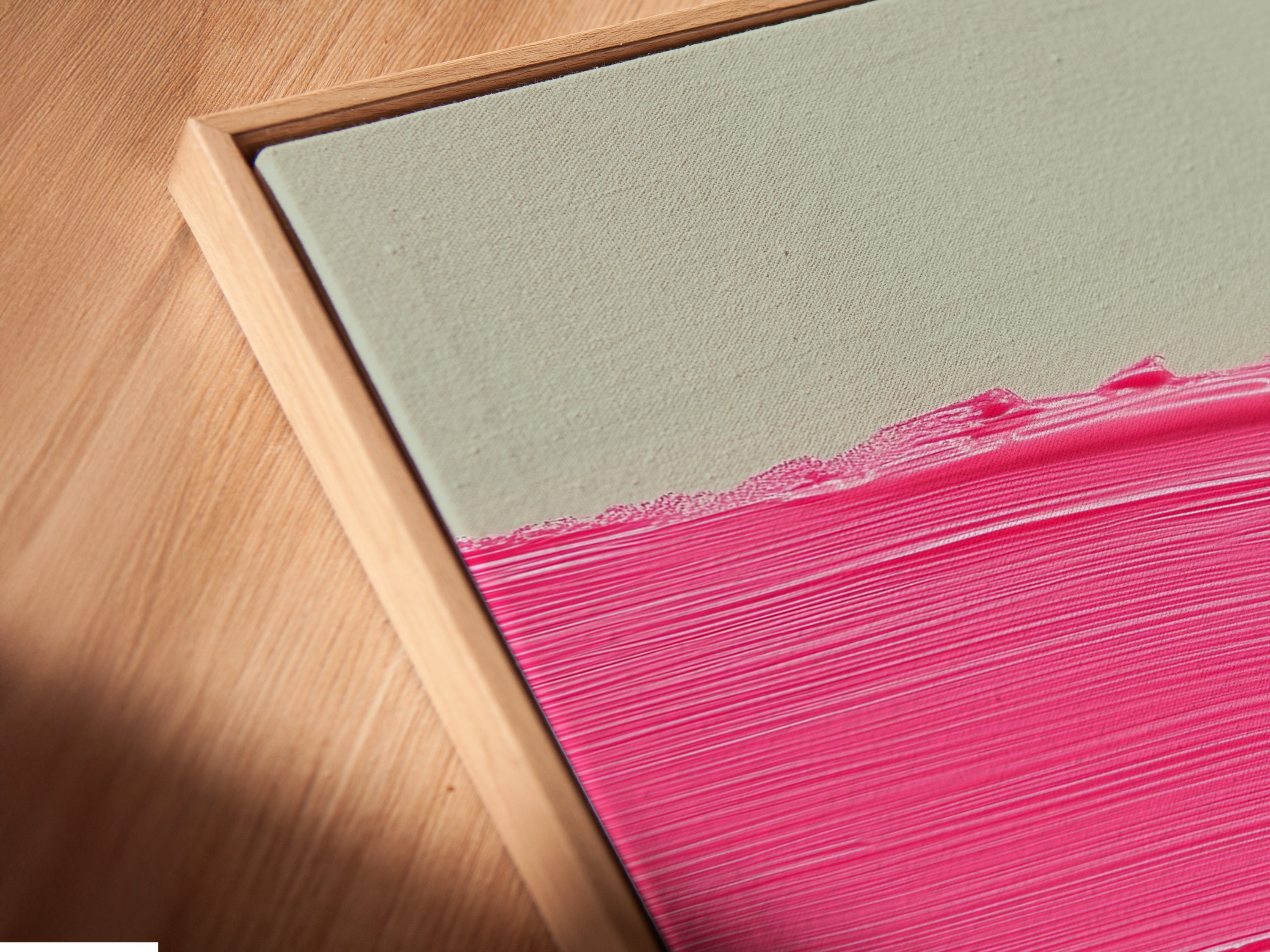 A close up angled view reveals the canvas print. It is set in a floating frame. This stylish presentation adds depth and dimension. It enhances the modern wall decor. The floating frame elevates the overall artwork's appeal.