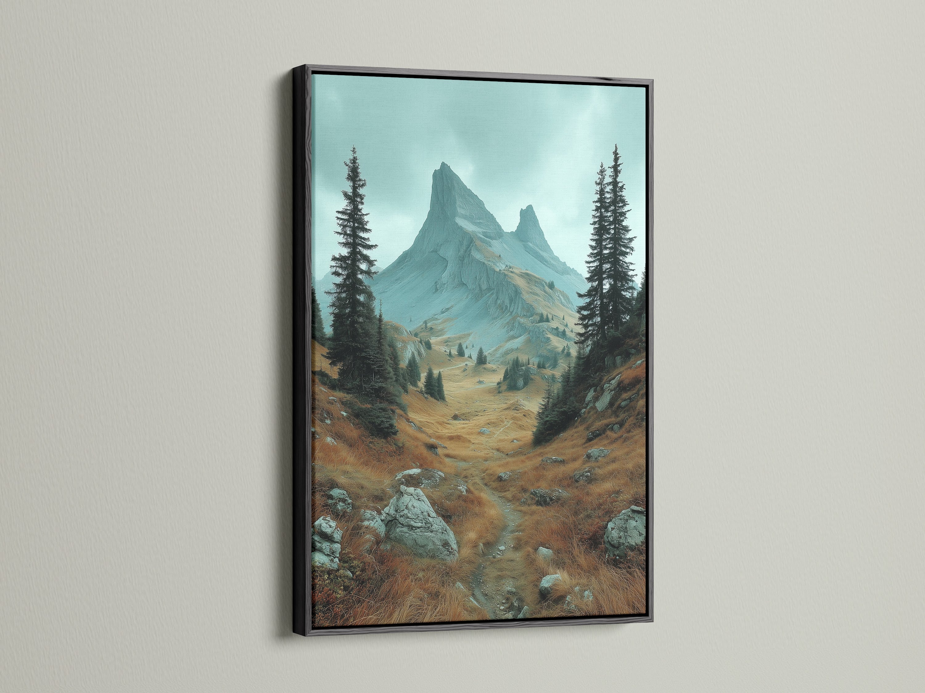 Black frame mountain landscape artwork. This wilderness canvas features a stunning alpine landscape. The black frame adds a modern touch to the rustic wall art. Perfect for creating a cozy cabin decor or living room wall art. Earth tones and nature print.