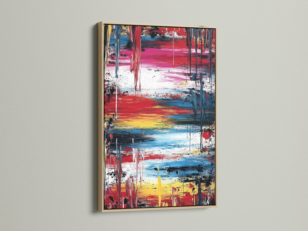 A vibrant abstract art print featuring bold paint strokes in an oak frame. The artwork showcases a blend of red blue and yellow creating a modern aesthetic. Ideal for adding color and style to your home or office.
