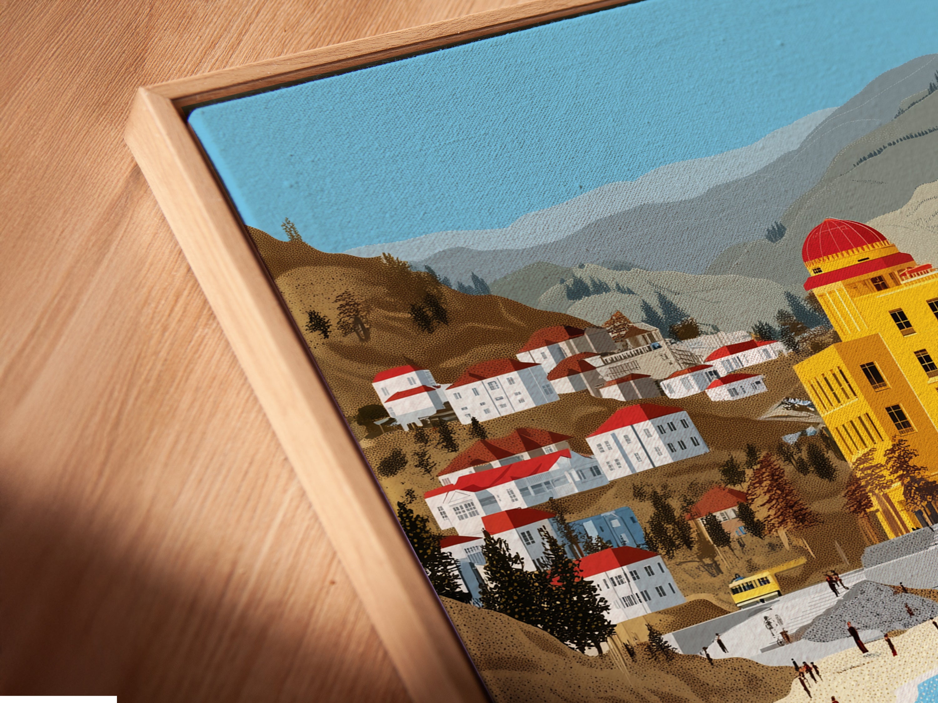 Close-up angled view of a coastal bird canvas print in a floating frame. The ochre and teal art adds a touch of the beach. Seaside decor for modern homes. A beautiful architecture art piece.