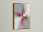 Abstract Burst artwork showcased in a luxurious gold frame. The pink orange and gray colors burst to life in this contemporary artwork. This explosion print adds a touch of glamour to any space. Perfect for elevating your living room or office decor. The gold frame exudes elegance.