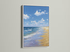 Artwork in a white frame. The artwork depicts a beach scene. The art is hanging on a white wall. The white frame provides a clean modern look. This artwork will enhance any living space.