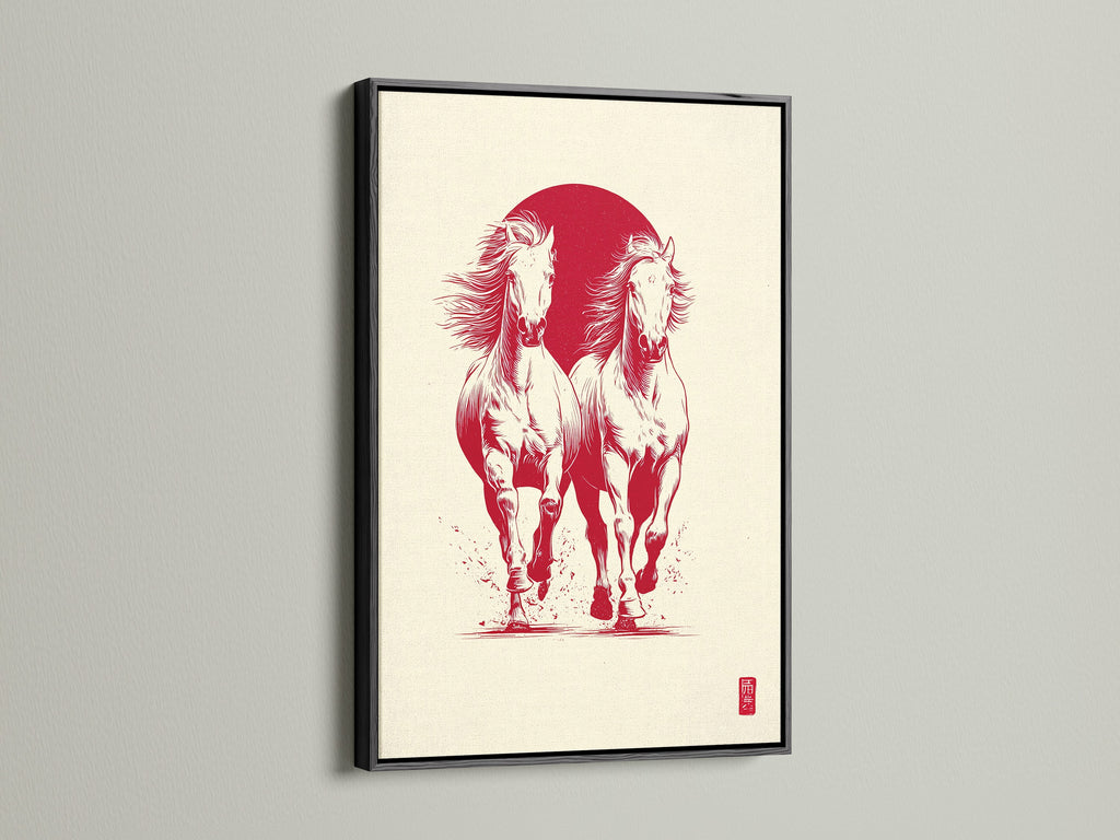 Artwork featuring two white horses running in front of a red sun. The art piece is displayed in a black frame. The black frame provides a bold contrast. It makes the colors in the artwork pop. The frame adds a touch of elegance.