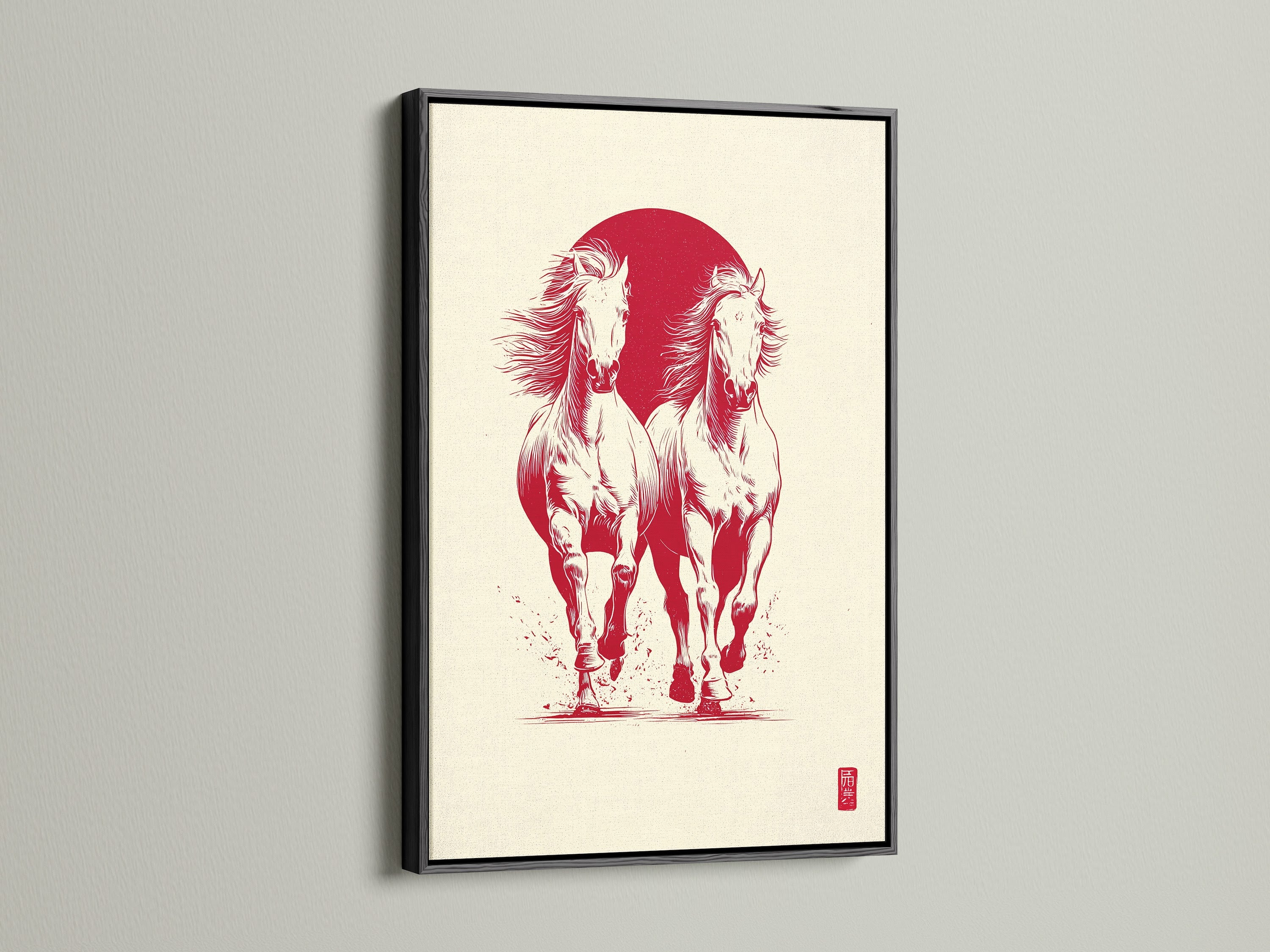 Artwork featuring two white horses running in front of a red sun. The art piece is displayed in a black frame. The black frame provides a bold contrast. It makes the colors in the artwork pop. The frame adds a touch of elegance.