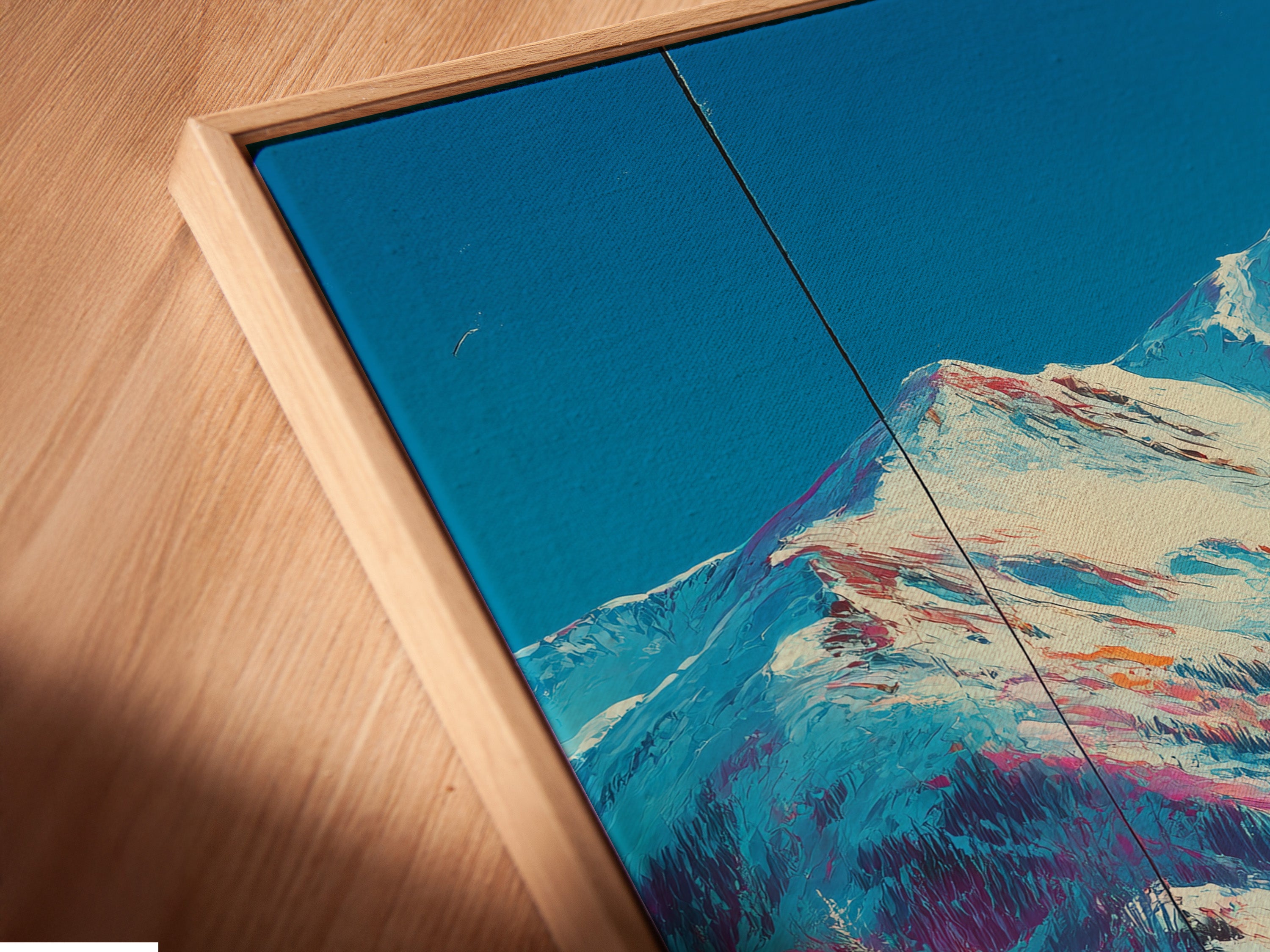 Close-up of Ski Resort Canvas Art in a floating frame. This artwork features a mountain chairlift. It is a winter sports poster for cabin decor. The alpine ski print is a beautiful piece. The floating frame gives it a modern touch. Elevate your walls.