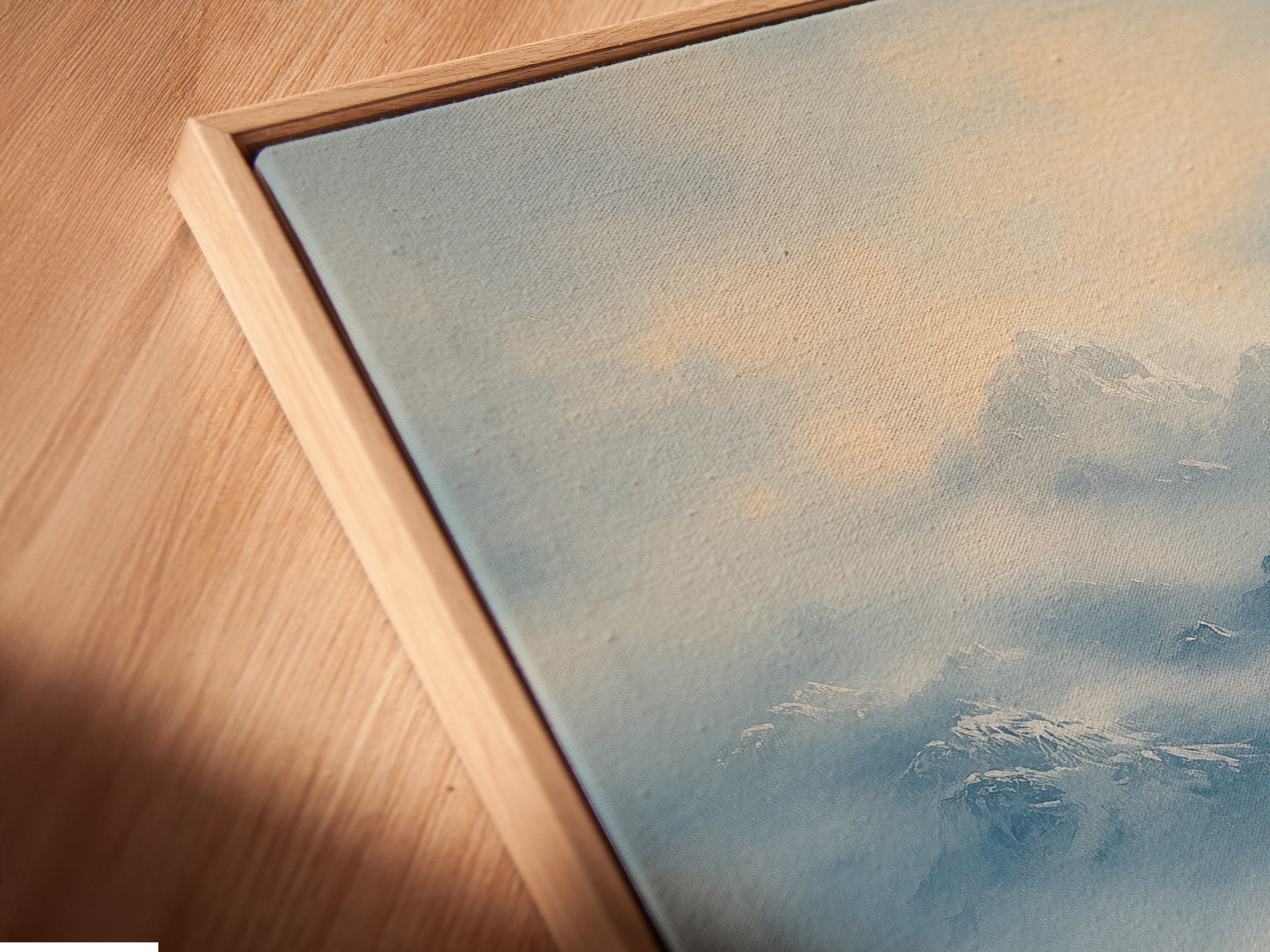 A close-up of a Native American Teepee Mountain canvas print in a floating frame. The floating frame gives the artwork a gallery-like feel. Perfect for showcasing indigenous artwork. This canvas print enhances cabin wall decor. It is ideal for southwest art lovers.