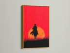 Cowboy Sunset Canvas Print with gold frame. The red orange silhouette of a horse rider adds a touch of western flair. This artwork is perfect for man caves offices or any space needing rustic wall decor. This is a stunning sunset wall art piece.