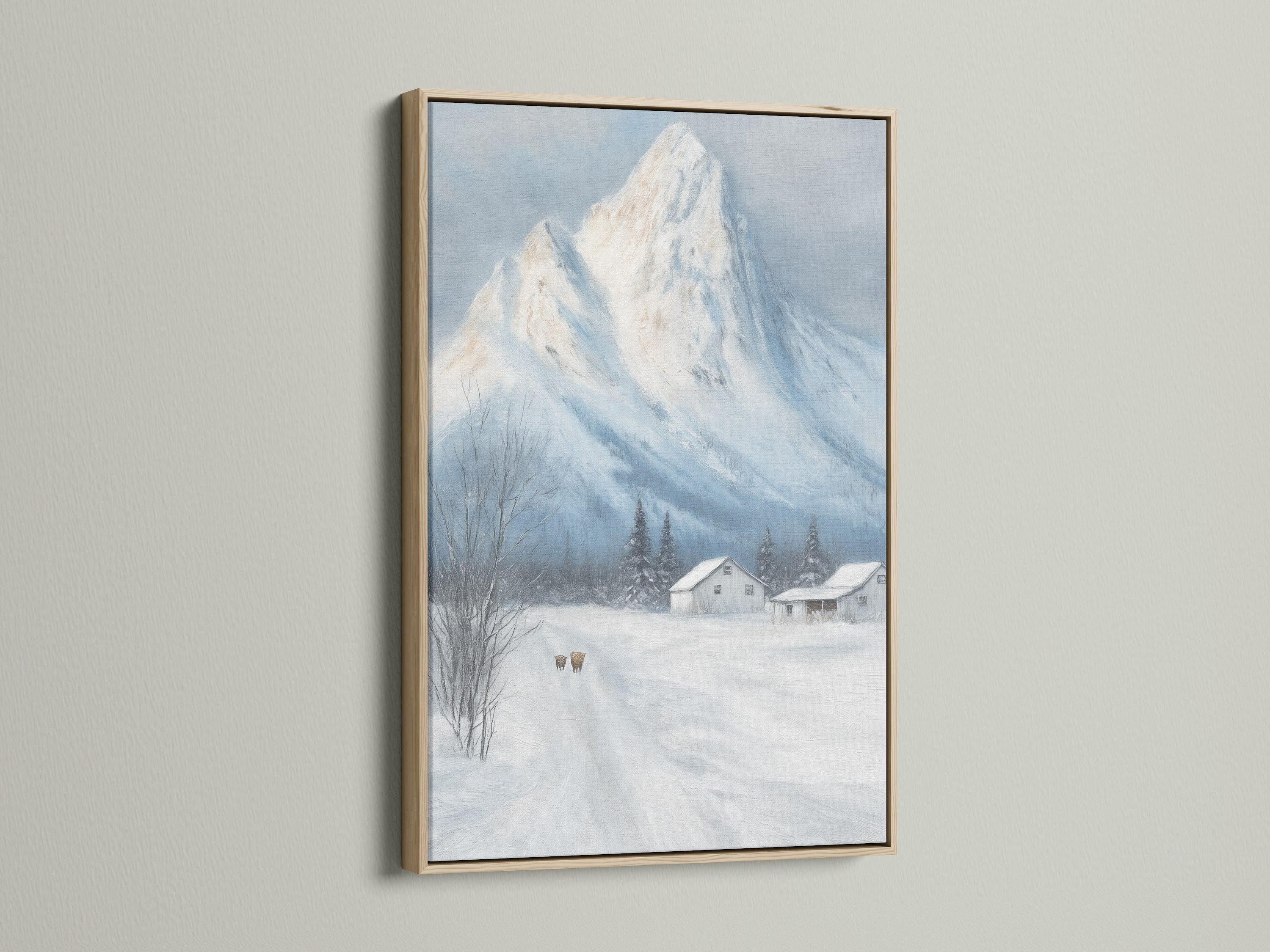 Winter Mountain canvas print is framed in oak. The snowy landscape wall art complements farmhouse decor for a cabin. The rustic artwork captures a serene winter scene. Ideal for adding warmth to any space with its natural beauty.
