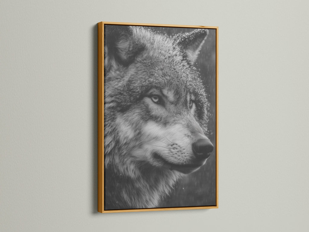 The wolf artwork is beautifully presented in a gold frame. This wildlife canvas adds a touch of luxury to your decor. The animal portrait is a stunning focal point. Elevate your wall art with this monochrome print.