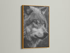 The wolf artwork is beautifully presented in a gold frame. This wildlife canvas adds a touch of luxury to your decor. The animal portrait is a stunning focal point. Elevate your wall art with this monochrome print.