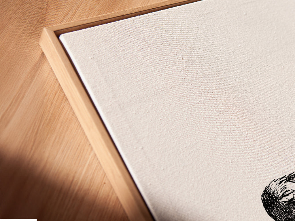 Get a close-up view of our canvas print in a floating frame. The angled perspective highlights the depth and texture of the canvas. The floating frame creates a modern gallery-like display. This framing style enhances any artwork. It provides a clean and sophisticated look. Perfect for contemporary spaces.