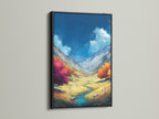 Mountain Valley Canvas Print in a Black Frame. This artwork captures a mountain valley. The autumn landscape is a scenic nature print. The black frame gives a modern touch. Bring fall colors into your home decor. It's an excellent choice for adding nature artwork to any room.